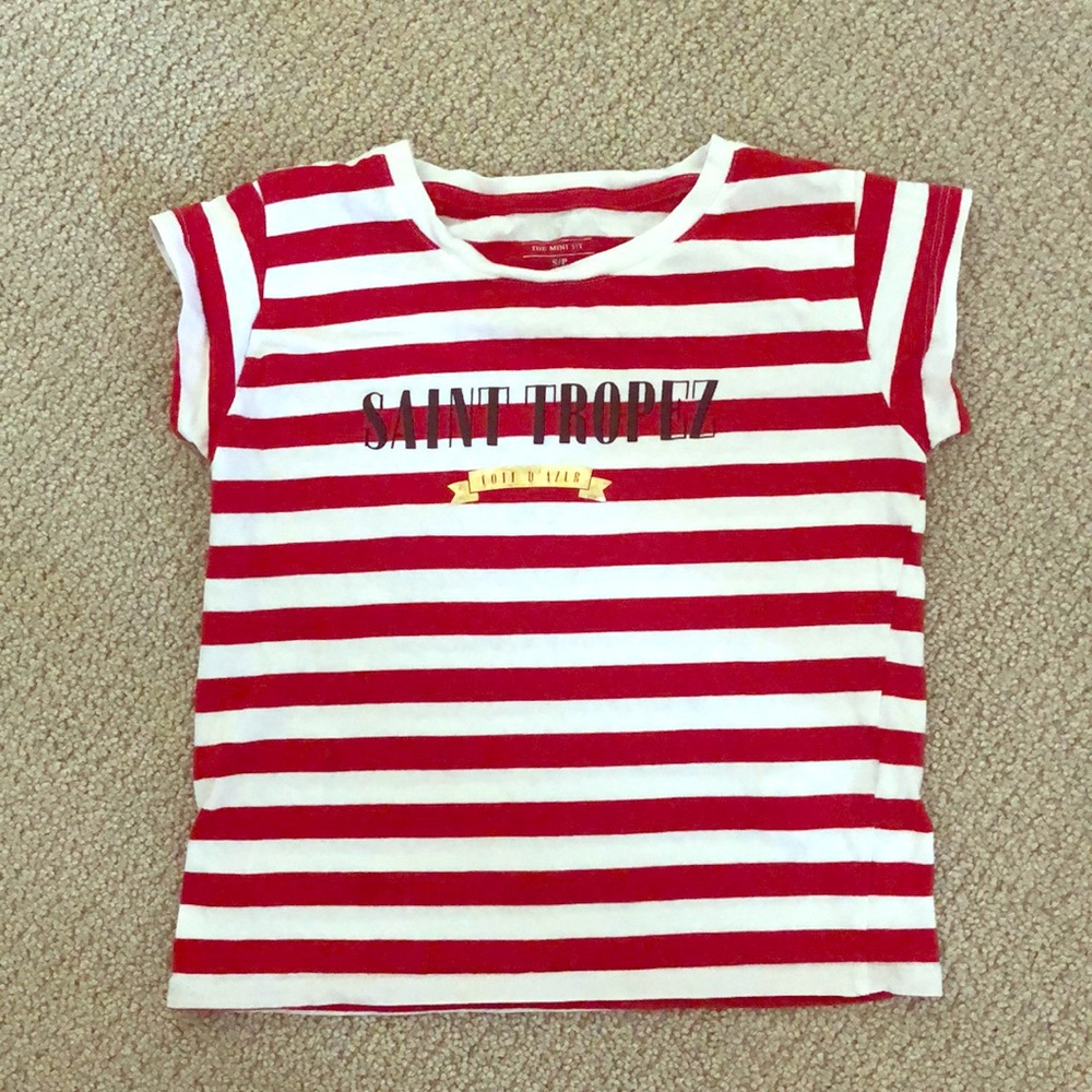 a small , “the mini fit” shirt